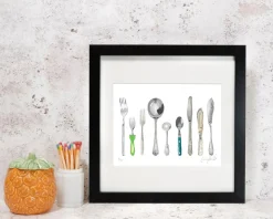 A Handful of Cutlery Framed Print by Corinne Alexander