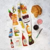 Store Cupboard Tea Towel by Corinne Alexander